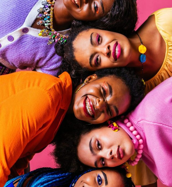 Beauty portrait of beautiful black women wearing colorful stylish clothes - Pretty african young women posing in studio, concepts about beauty, cosmetology and diversity